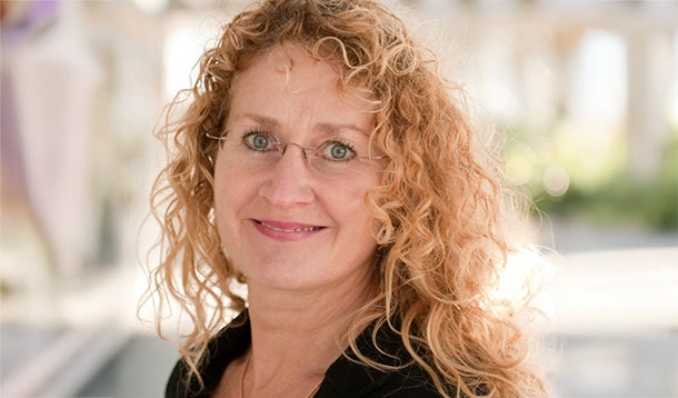 A close-up of a smiling woman