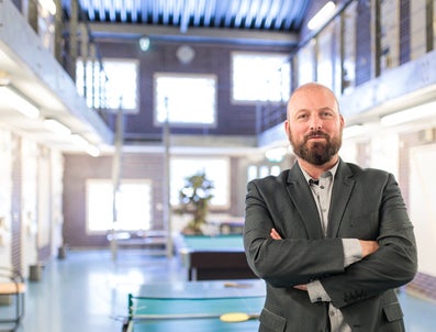 A man with his arms crossed