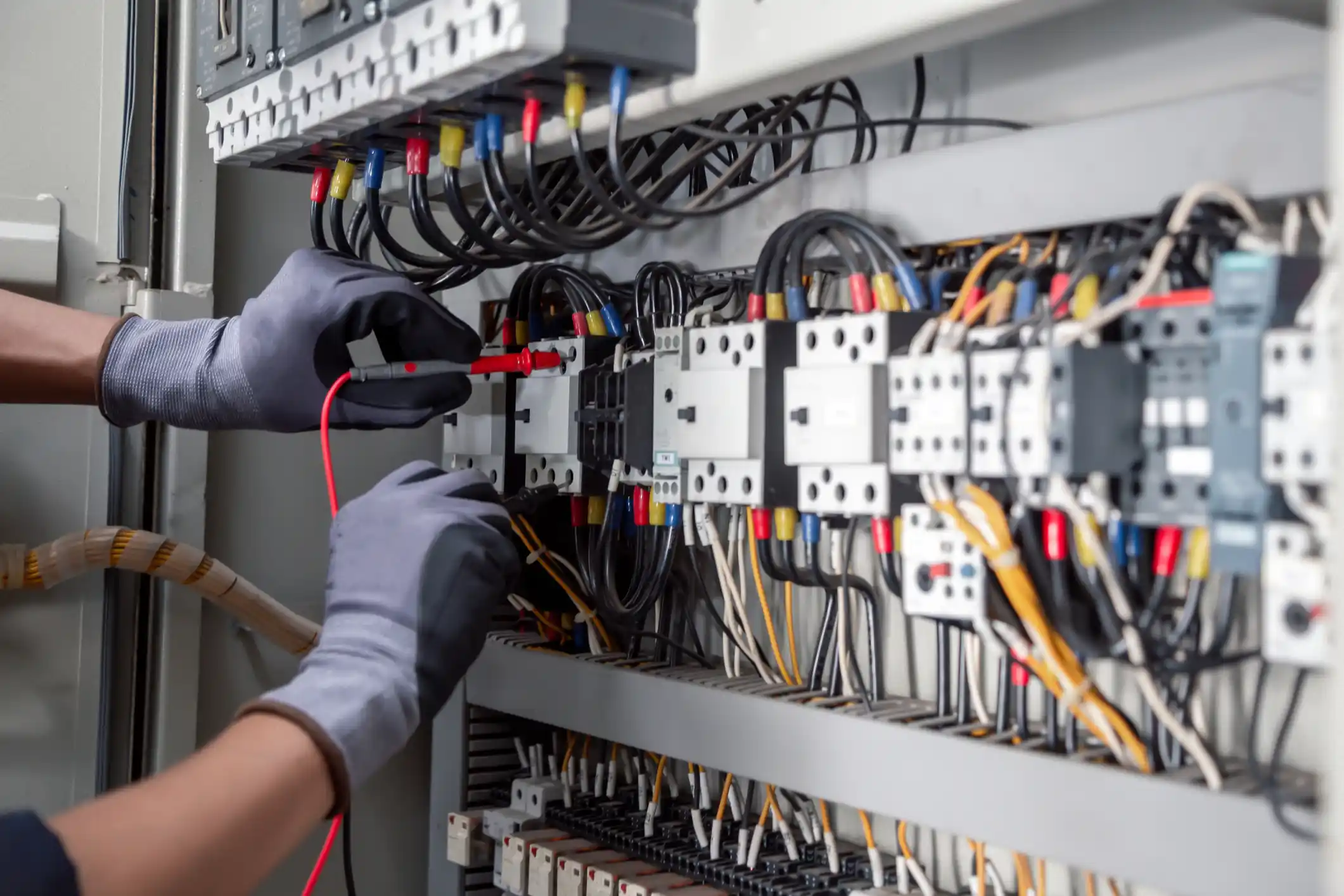 Electrical panel builder tests industrial electrical circuits