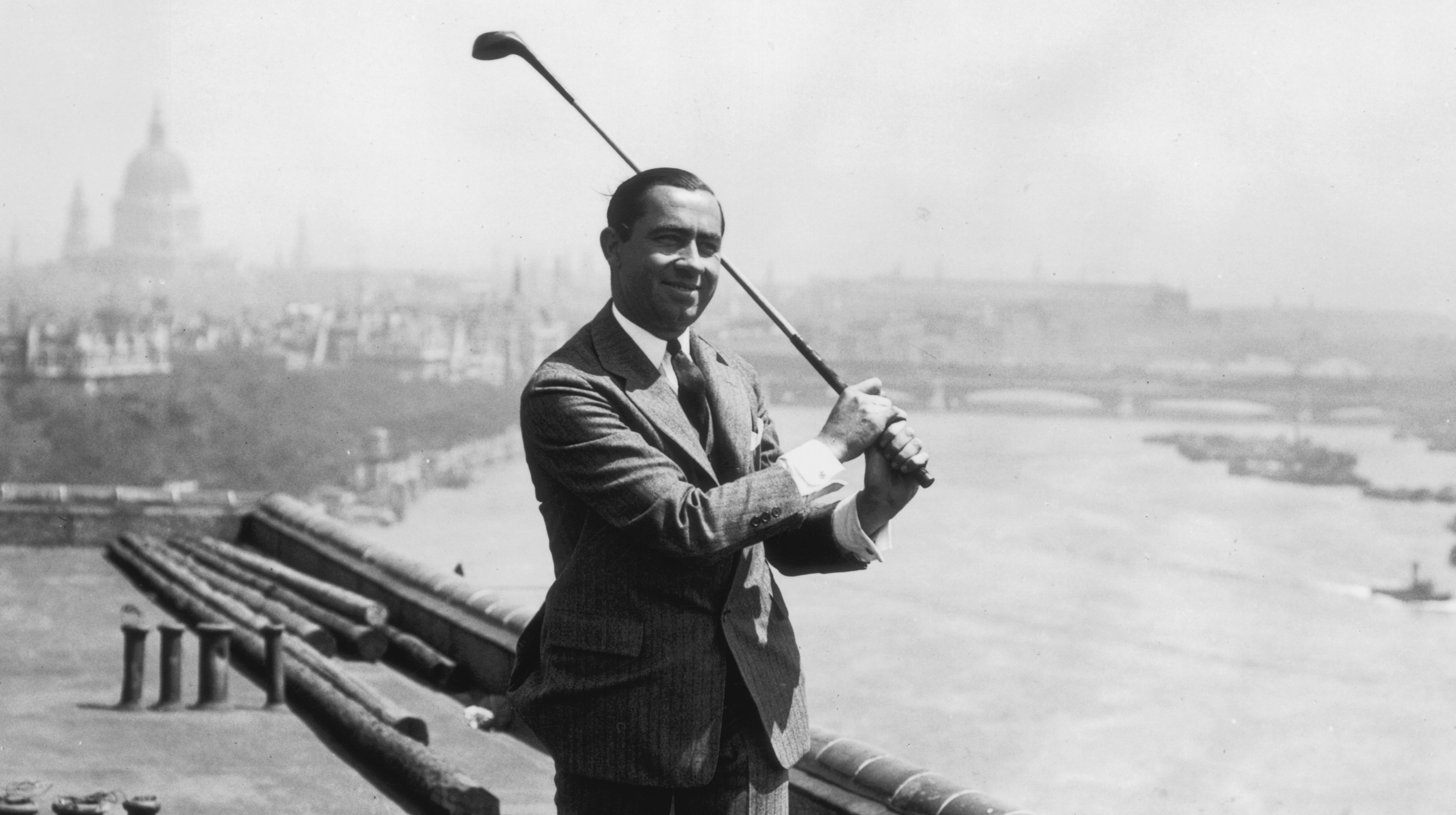 Walter Hagen hitting a shot off a rooftop