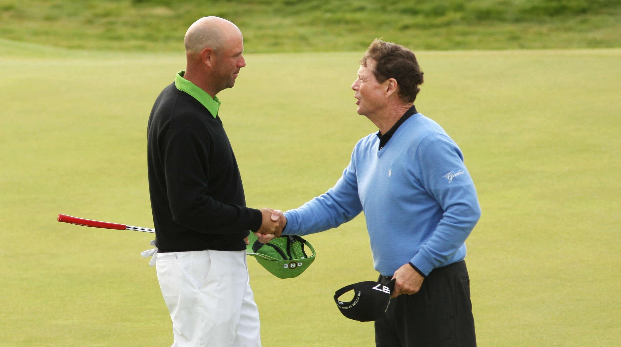 Tom Watson shaking hands with Stewart Cink