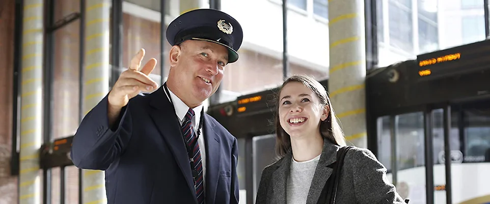Photo of an Inspector Assisting a Customer in Busaras
