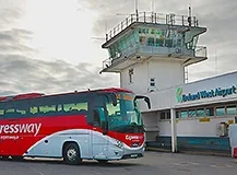Image of a Bus Éireann Expressway bus parked in front of Ireland West Airport Knock