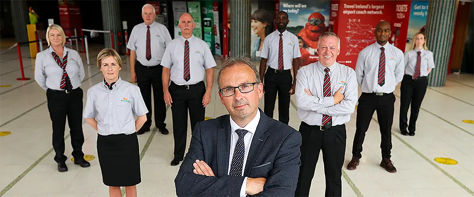 Photograph of Bus Éireann CEO and Bus Éireann staff in Busaras