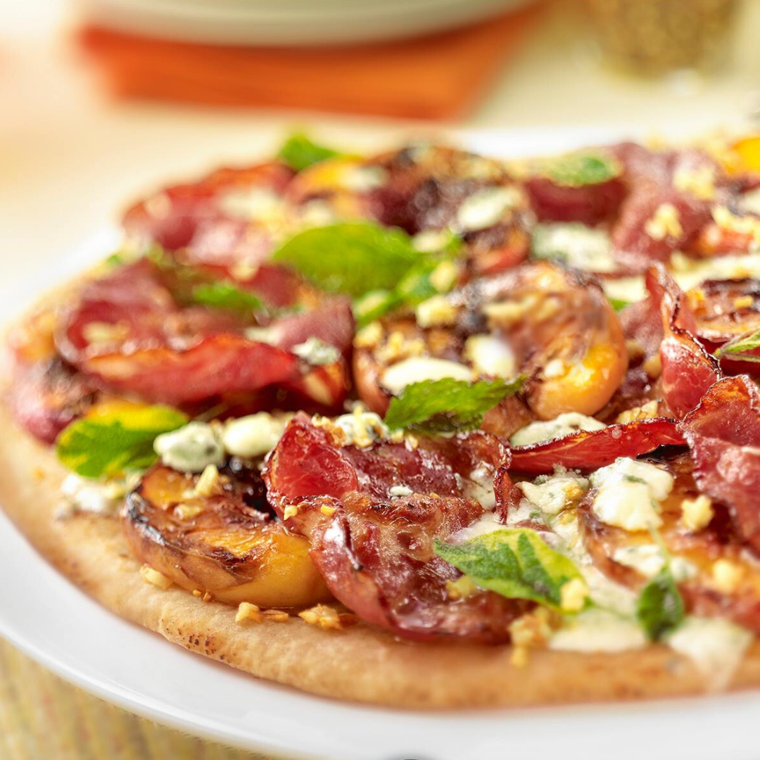 Pizza with Capicola Ham, Grilled Peaches and Gorgonzola Cheese