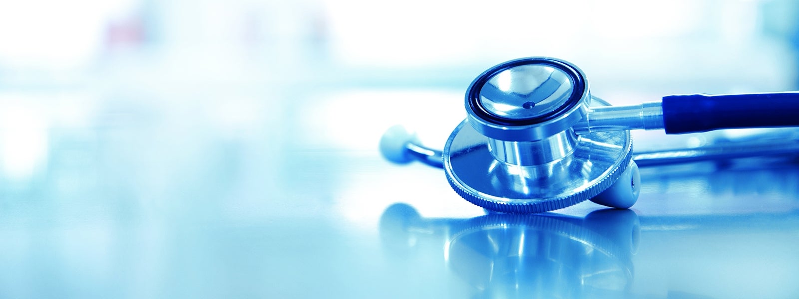 Stethoscope resting on a clean surface