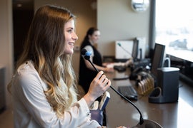 Teller talks on microphone