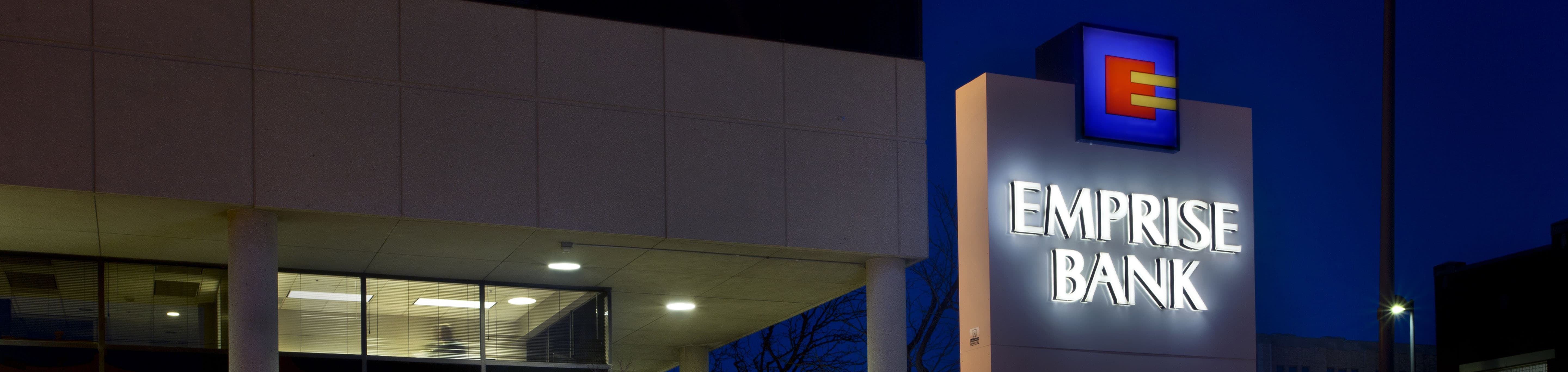 Emprise Bank exterior at night