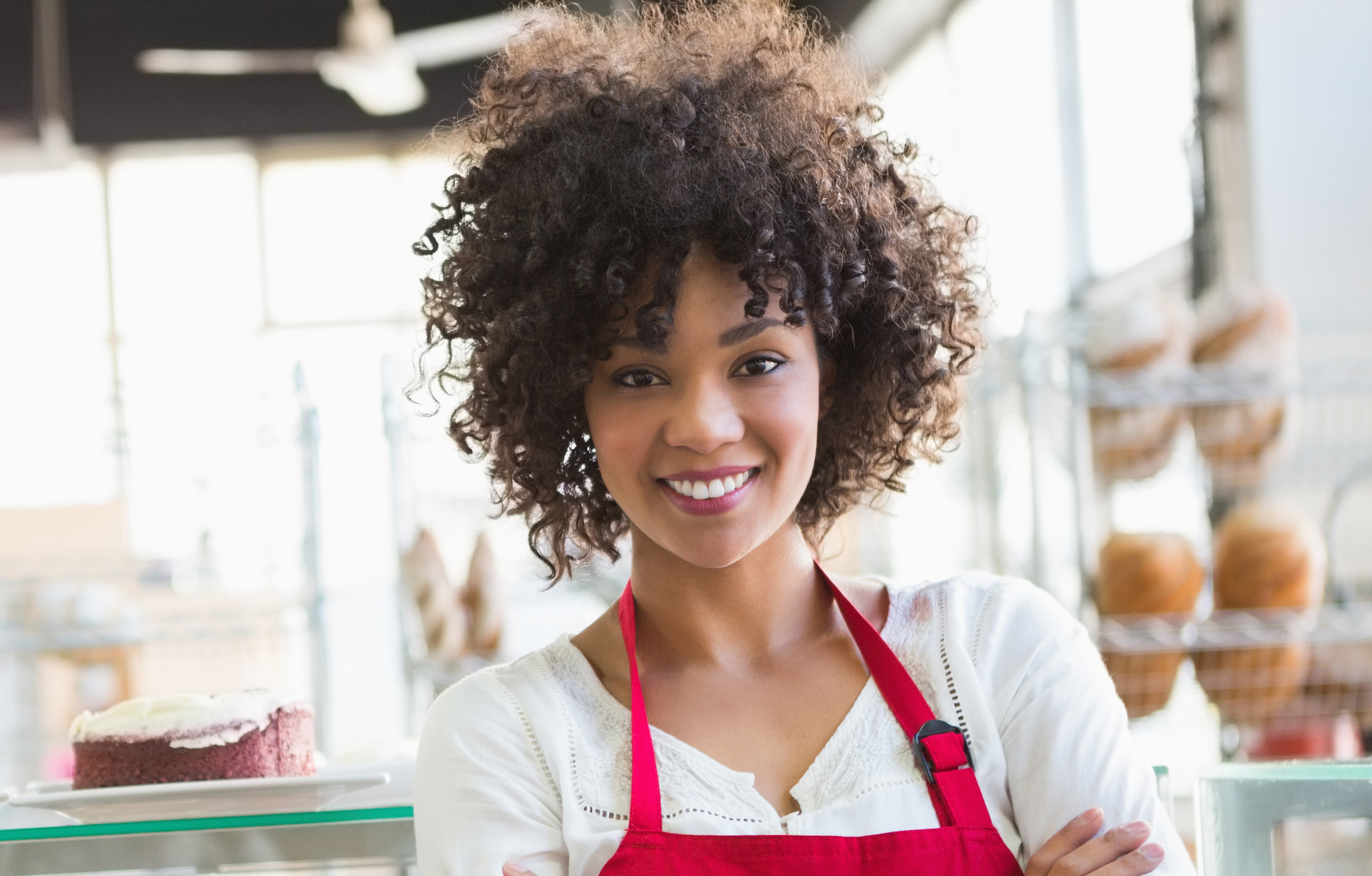 Business owner of bakery in apron