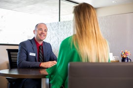 Branch manager smiles during interview
