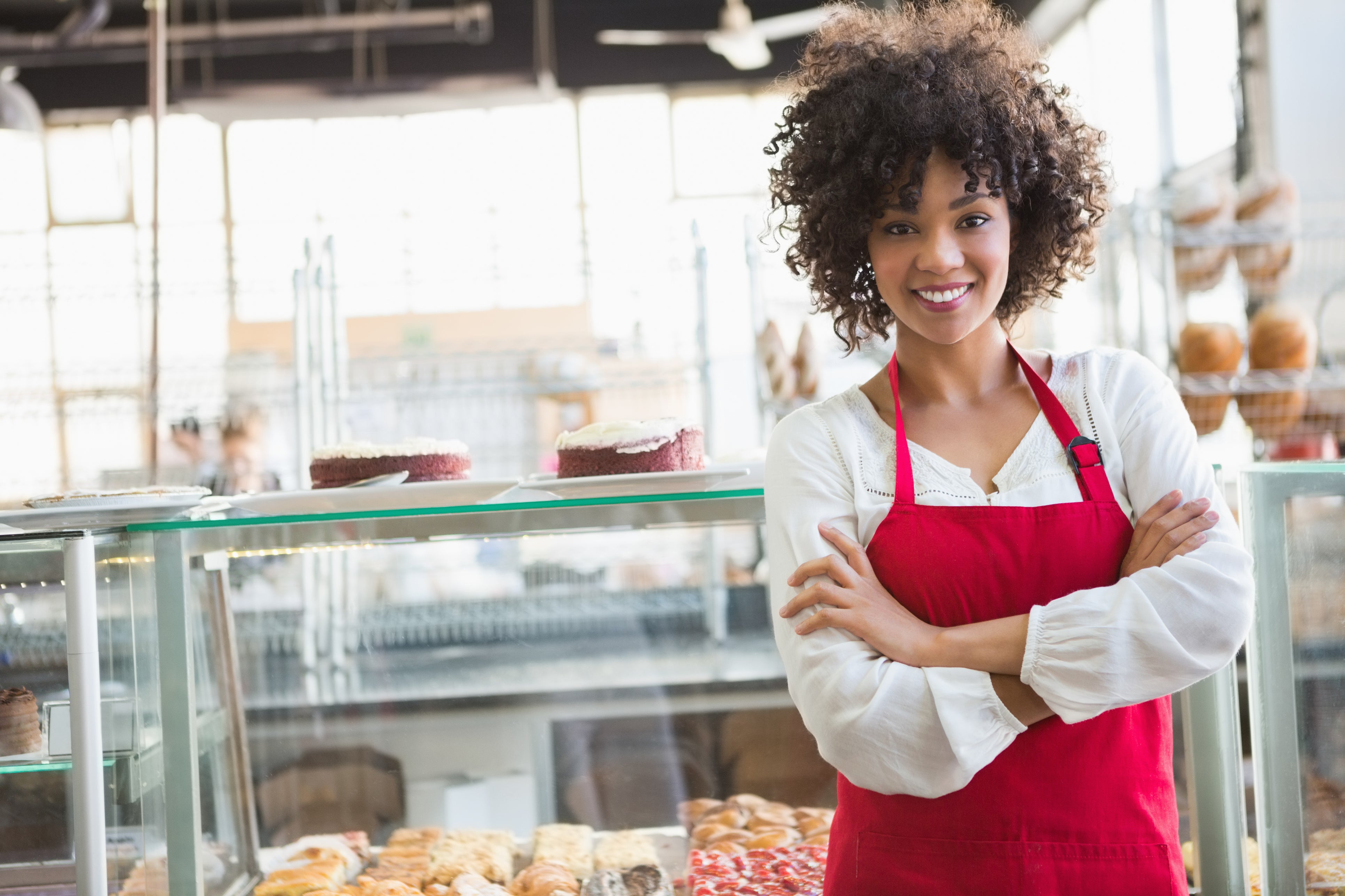Business owner of bakery in apron