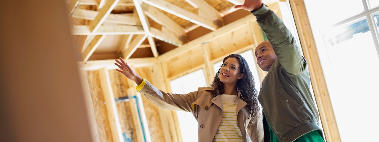 Couple looking at new home build together