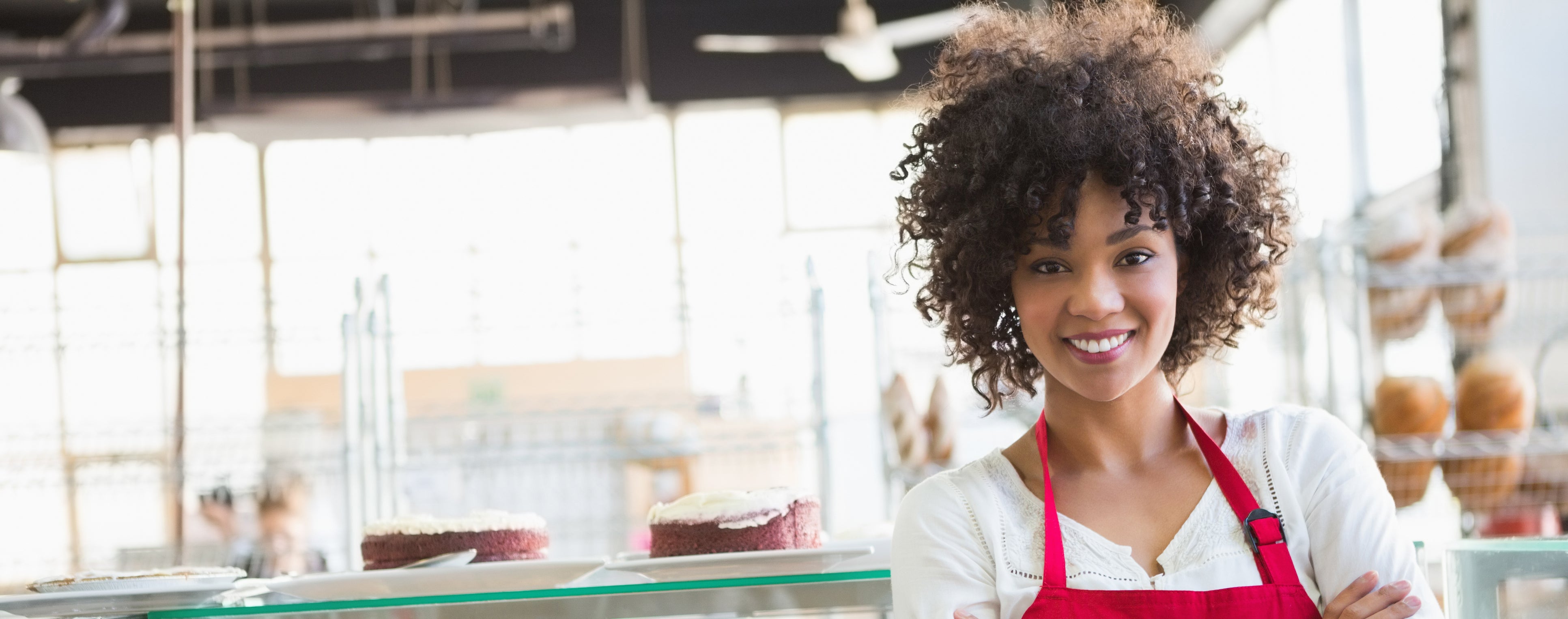 Business owner of bakery in apron