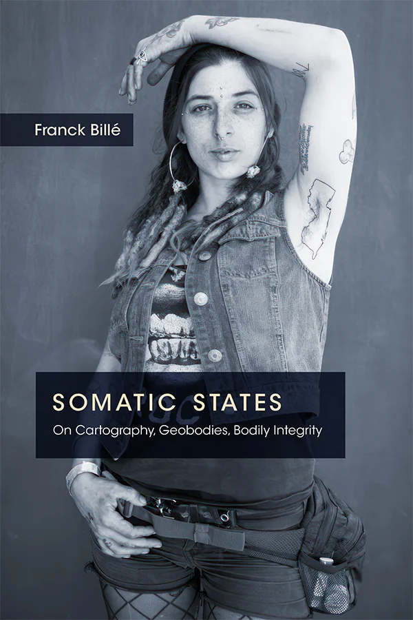 Cover art of Somatic States is a medium shot of a woman with her left hand posed above her head and right hand resting on her belt. She has several tattoos, most notably a New Jersey outline surrounding her armpit.