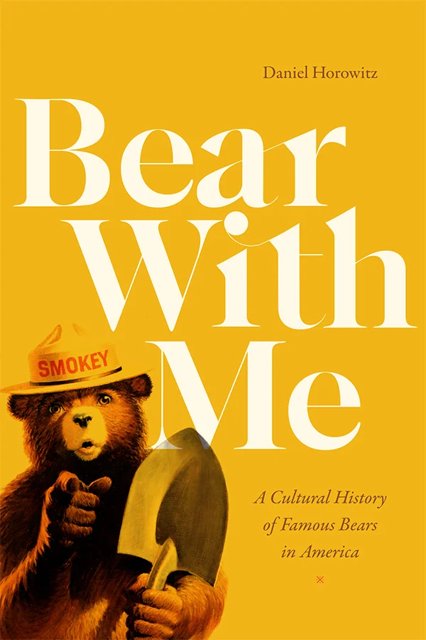 Cover of Bear With Me is yellow and features an image of Smokey the Bear, holding a shovel, pointing directly at the viewer.