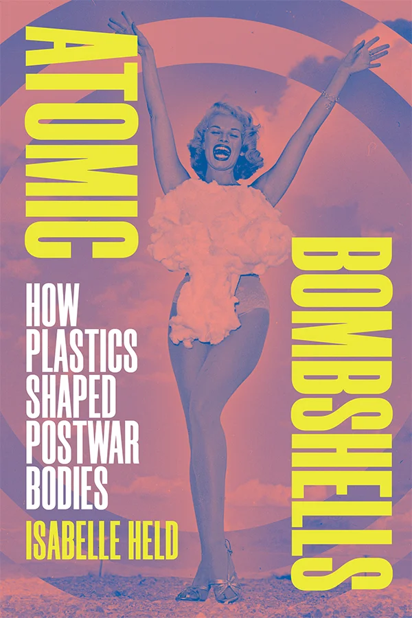 The cover is a a blue and coral pink duotone of a woman wearing a leotard that depicts a mushroom cloud. She is posing with her hands up and her mouth open in joy. The blue and pink are inverted to create circles around her.