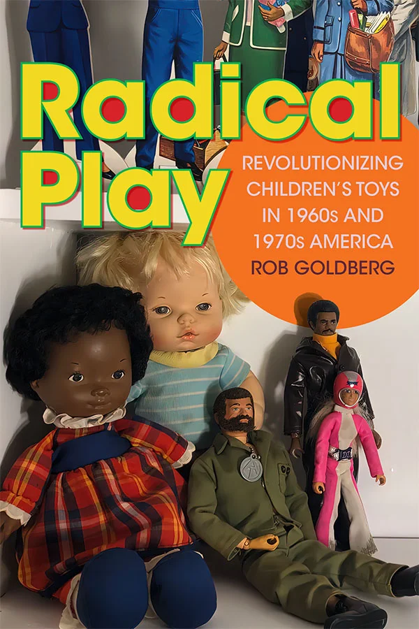 Cover of Radical Play features a photo of dolls: a black baby in a plaid dress, a white baby in a blue shirt, a soldier, a black man in a leather jacket, and a white Barbie in a biker outfit. In the background are cutouts of other Barbies.