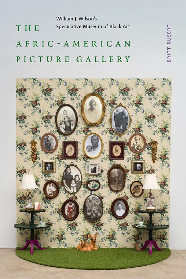Cover of The Afric-American Picture Gallery has a wall of framed historical portraits atop grass against a floral wallpaper, with tables on each side.