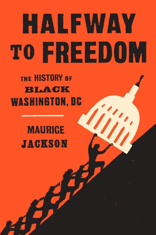 Cover of Halfway to Freedom is a print style featuring a line of people pushing the top of a monument up a steep hill. The people and the hill are black; the monument is off white, and the background is red orange.