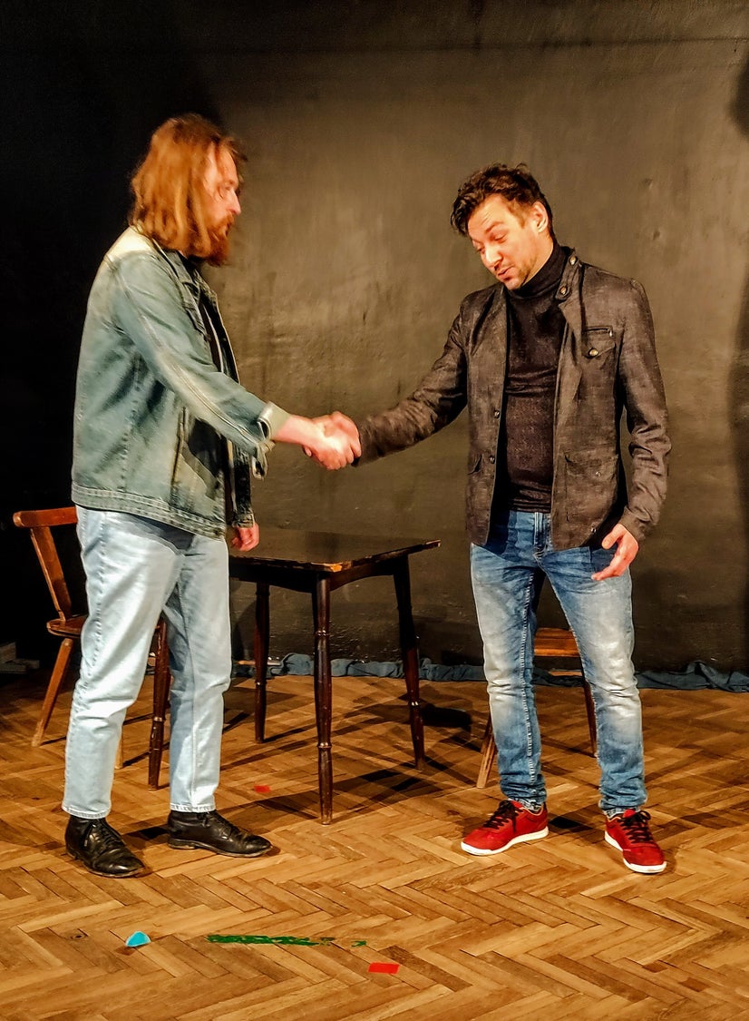 The Marshal shakes Baron Krüg's hand.