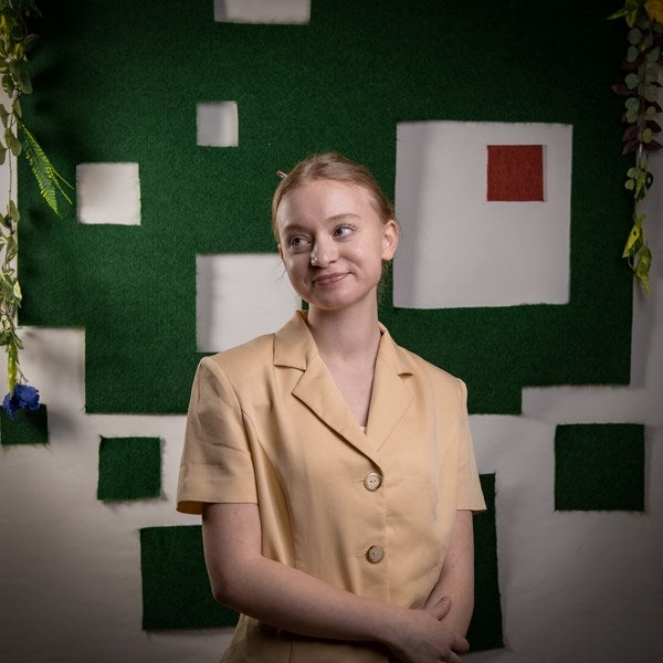 An actor looks away from the camera.