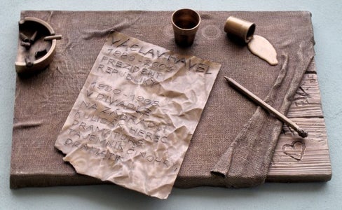 A photo of the plaque about Havel's many roles.