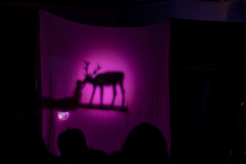 Shadow puppets showing Smolíček, a boy raised by deer with golden antlers