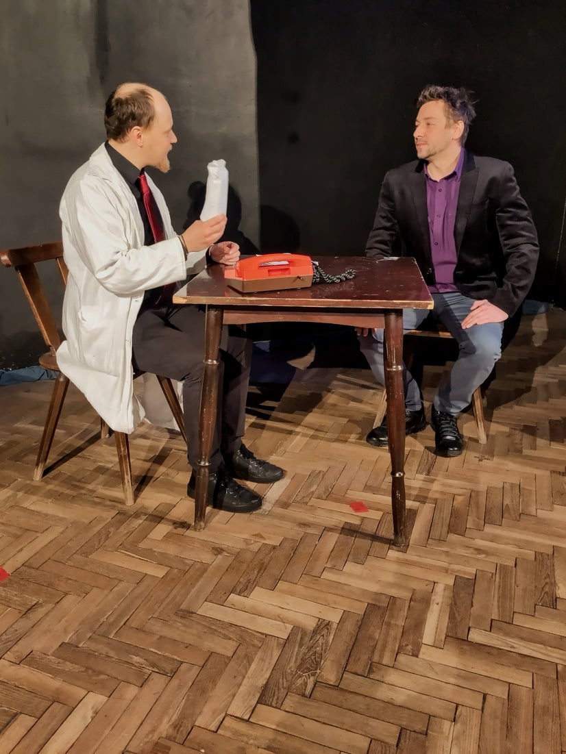 Sometimes a spoonful of money helps a disease go down, as here, with Sigelius holding an envelope of cash from Baron Krüg.