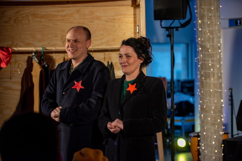 Two happy Communists spread their message