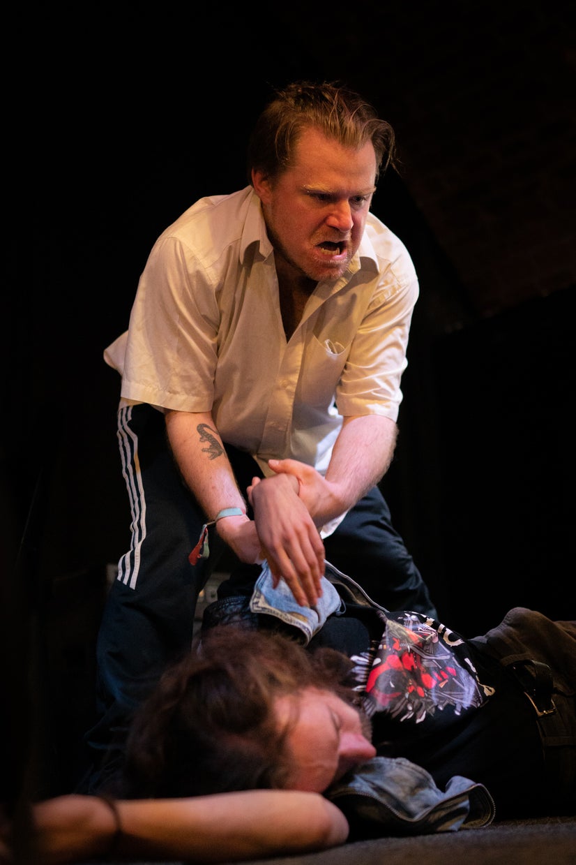 Jenda over the body of Slávek.