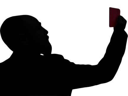 A silhouette of a man with a beard holding a card in his outstretched hand.