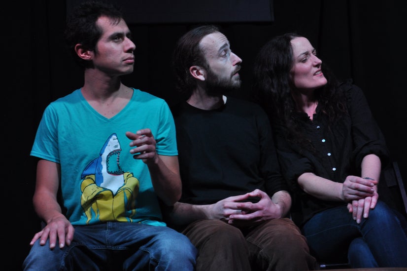 Michal, Vaněk, and Věra admire the newly furnished room.