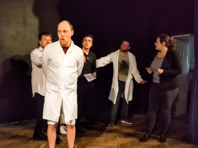 Sigelius reacts badly to developments as his assistant leads the press away.