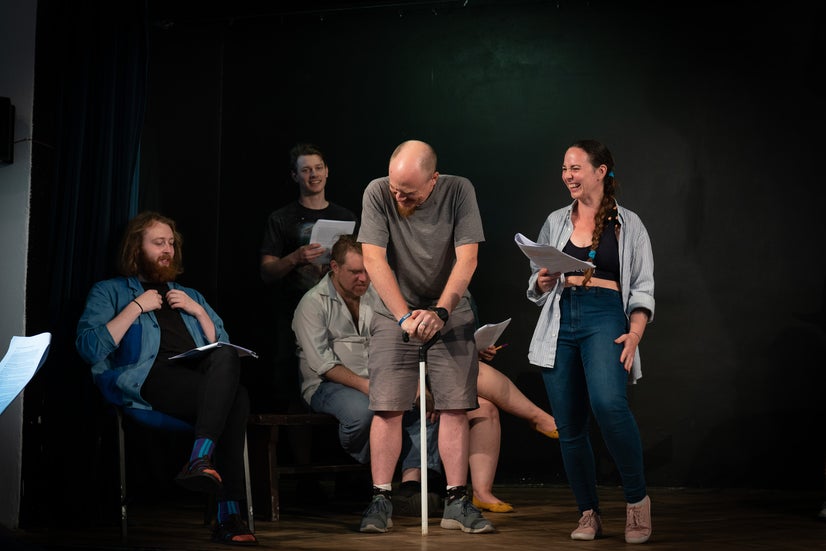 Petr talks and talks and talks while the others laugh.