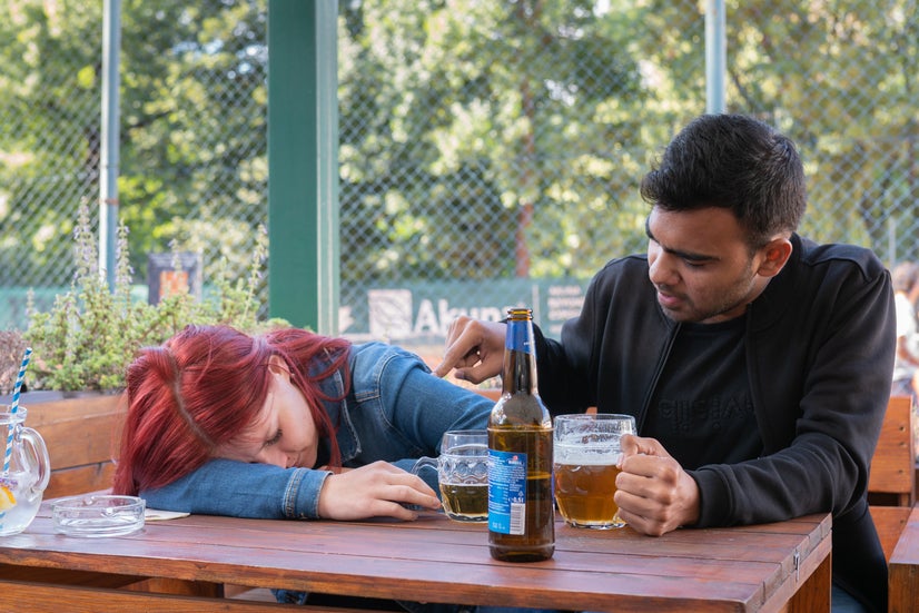 Dušan checks on a sleeping Renata.