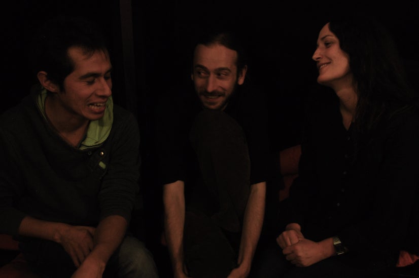 The actors share a laugh during practice.