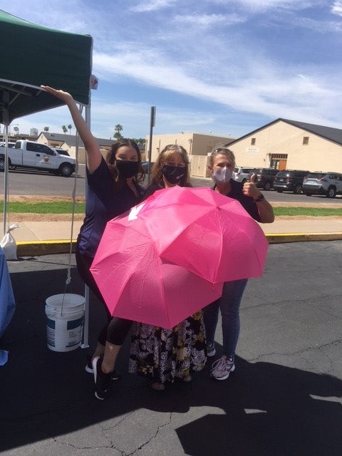 Pink umbrellas indicate where older adults can get a Lyft