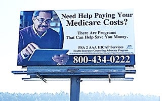 Billboard asking Californians if they need help with Medicare costs