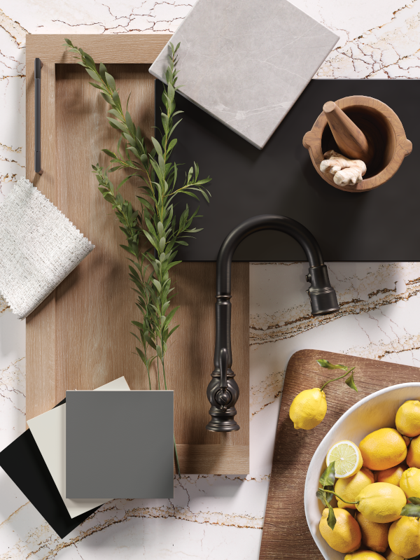 A flat lay of kitchen cabinet doors along with kitchen hardware.