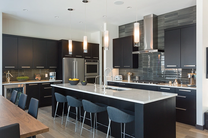 A modern-style kitchen with brown cabinets.