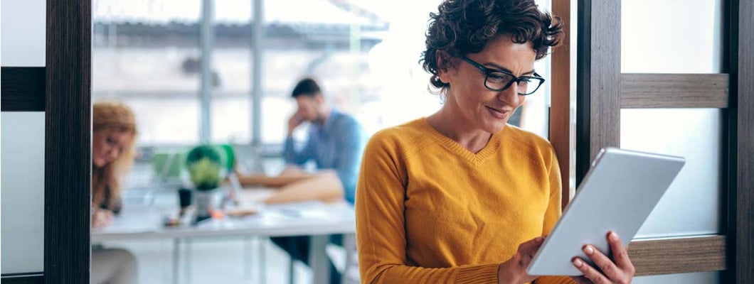 Woman using tablet in the office