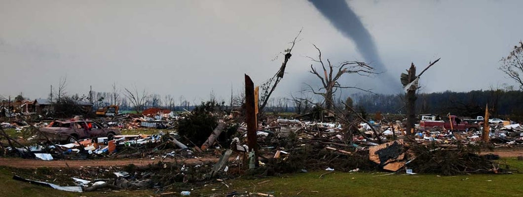 A tornado on the ground shortly after destroying a small neighborhood.