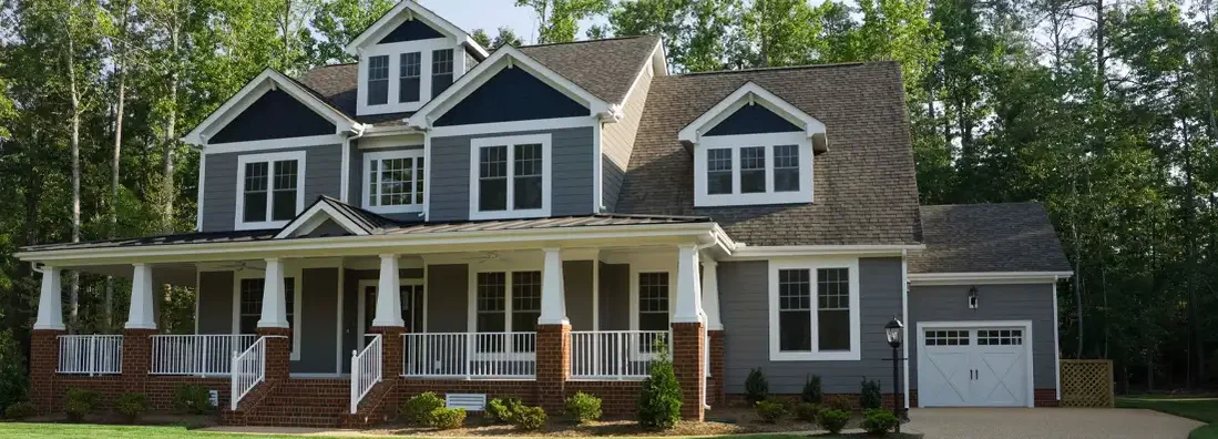 Exterior of house in suburbs. How to Find the Best Homeowners Insurance Policy in West Linn, Oregon.
