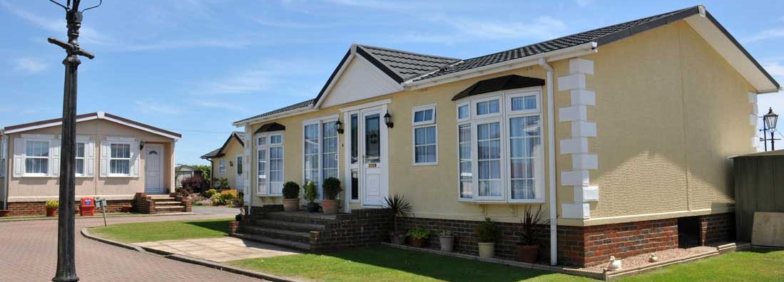 Fancy residential mobile home on beautiful property. Mobile Home Insurance Claims.