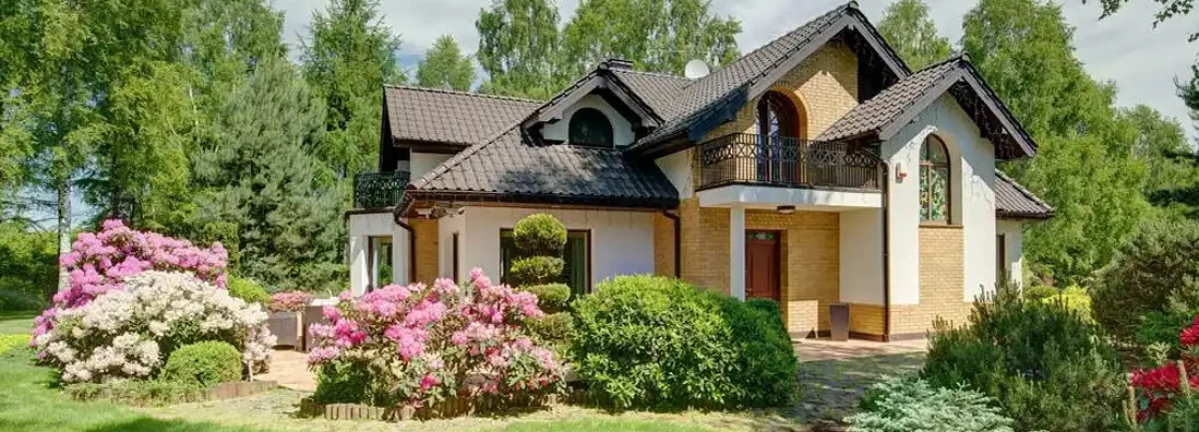 Photo of elegant new villa with backyard. Westfield, Indiana Homeowners Insurance.