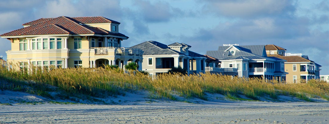 A row oceanfront beach houses.