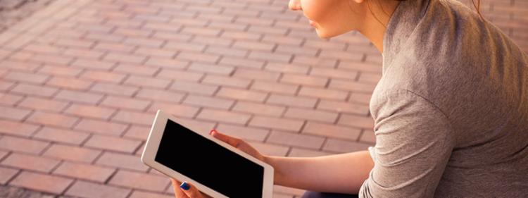 woman using tablet