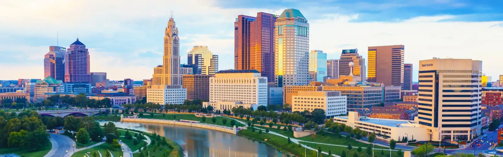 Aerial view of Downtown Columbus Ohio with Scioto river during sunset. Find Ohio insurance.