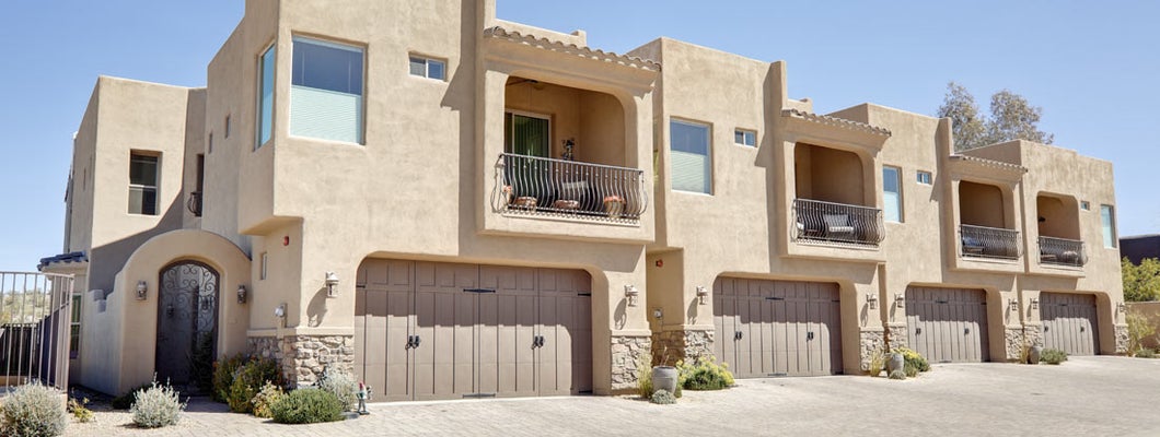 A shot of modern apartments in the southwest. Find New Mexico renters insurance.