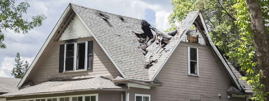 Roof of a house burned and caved in. What is Loss of Use Coverage for Homeowners?  